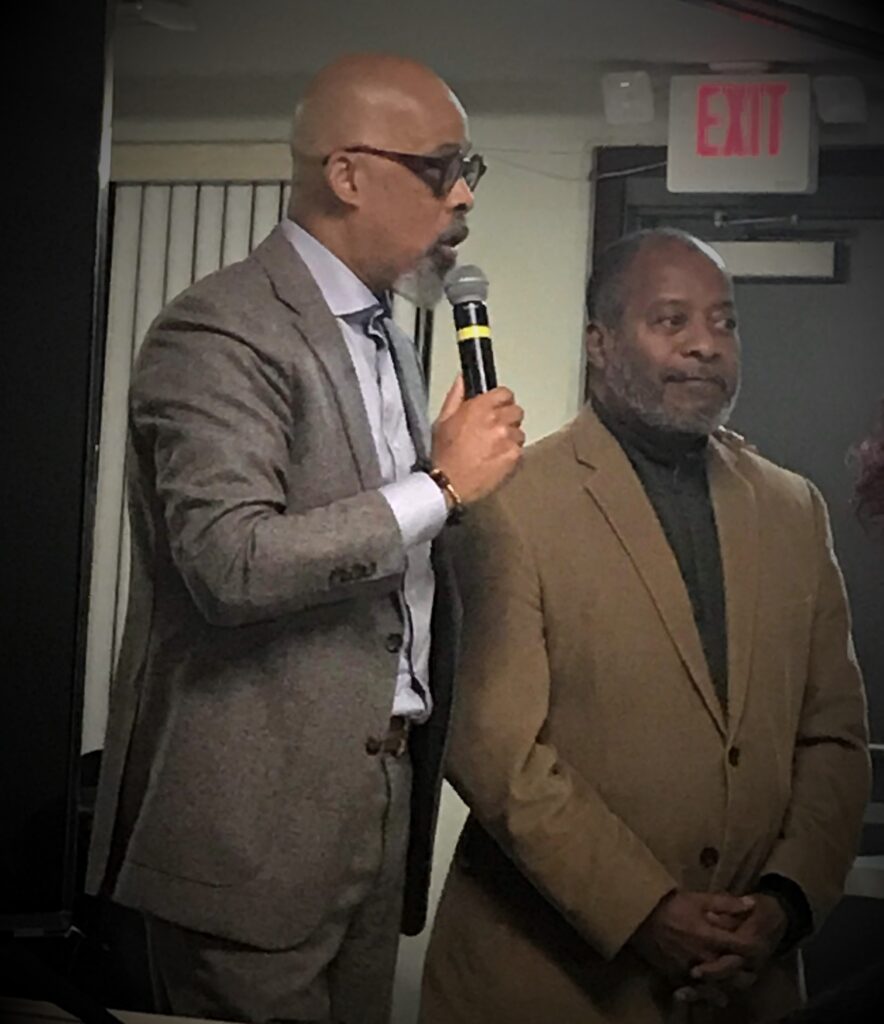 Image of Bishop Tyson and Donald King standing together as if speaking to an unseen audience